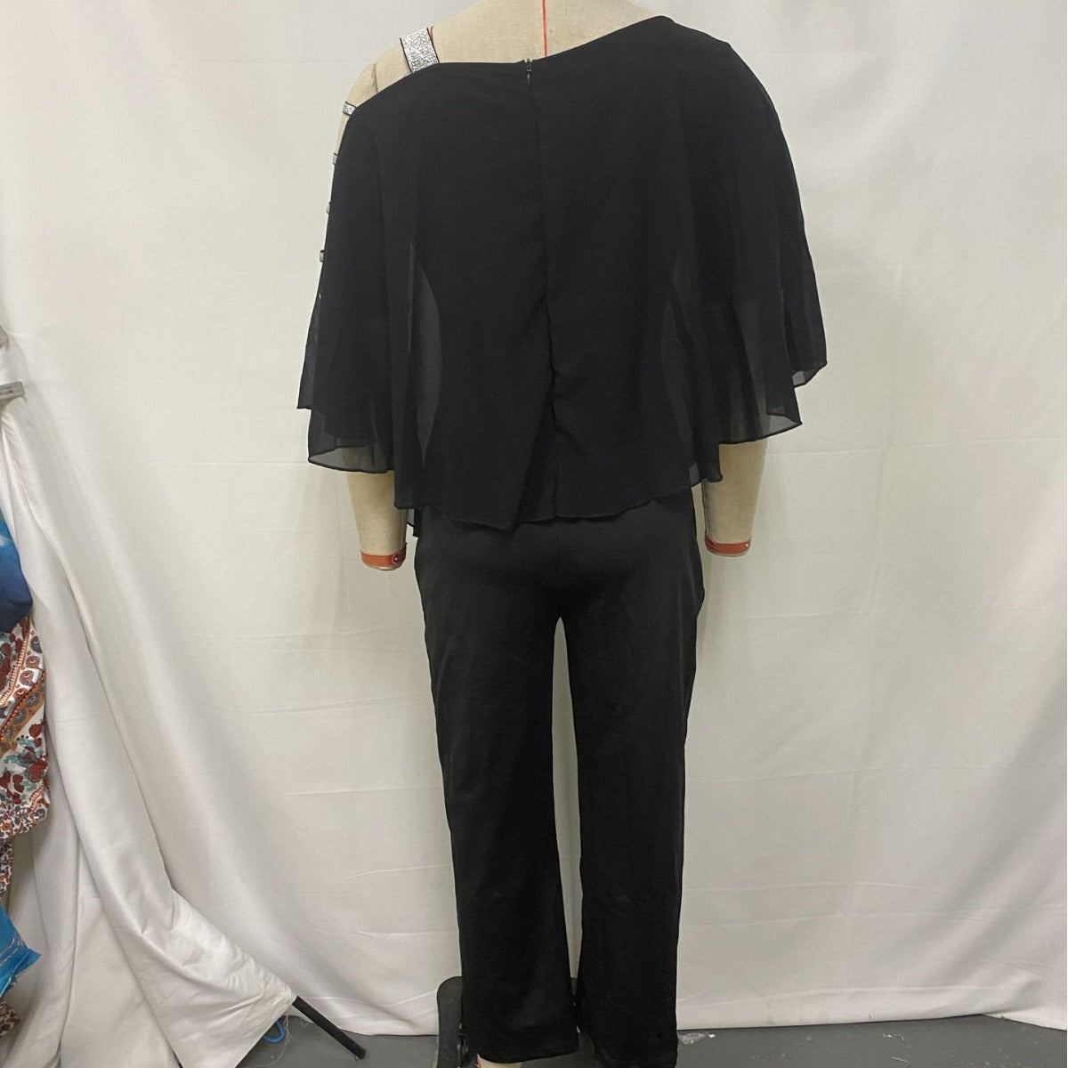 Solid color irregular off-the-shoulder one-piece flared pants for women's clothing