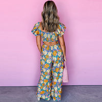 Spring and summer new ruffled jumpsuit women's fashion trend flower print high waist wide leg trousers women