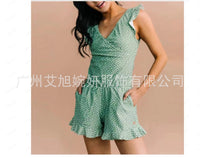 A versatile wave-striped tight-fitting spaghetti-strap sleeveless commuter jumpsuit for women